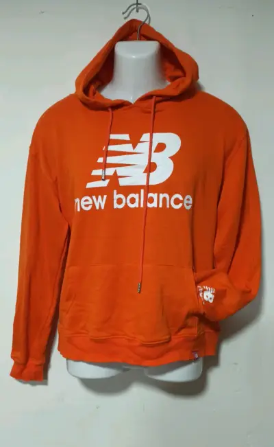 Polerón New Balance naranja con capucha - miniatura 1