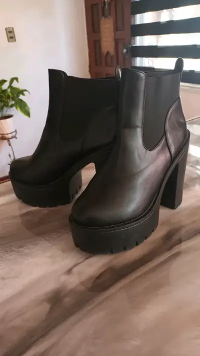Botines negros de cuero con plataforma - miniatura 1