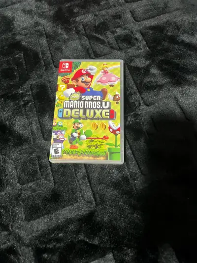 Juego Nintendo Switch New Super Mario Bros Deluxe - miniatura 1
