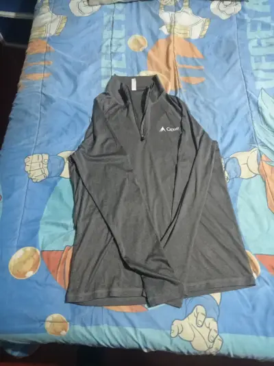 Polera deportiva gris con cierre Crowe - miniatura 1
