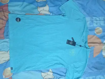 Polera azul Maui con etiqueta nueva - miniatura 1