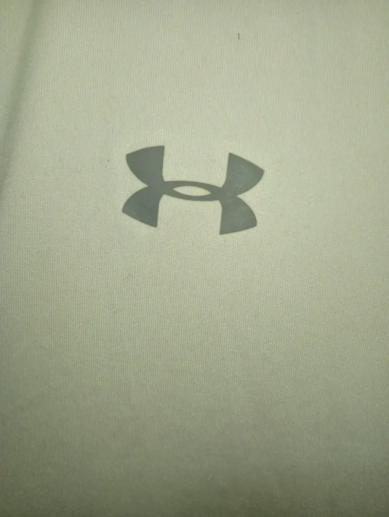 Polera deportiva Under Armour blanca - 2