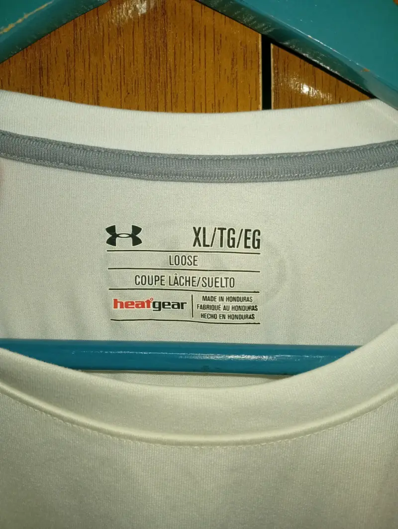 Polera deportiva Under Armour blanca - 3