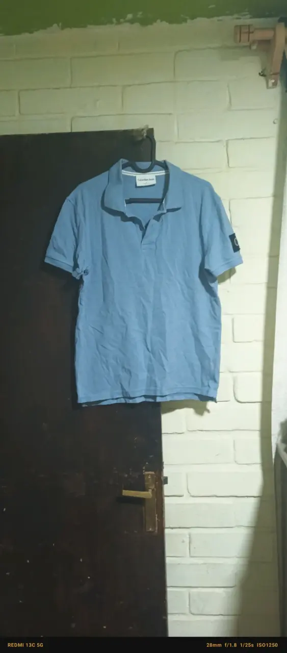 Polera polo azul Calvin Klein