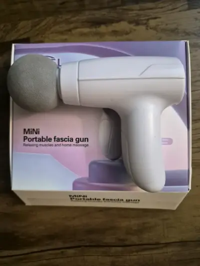 Mini pistola de masaje portátil - miniatura 1