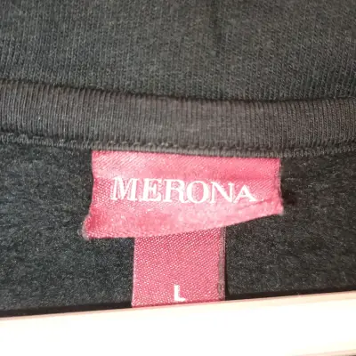 Suéter negro con cuello abotonado - miniatura 4
