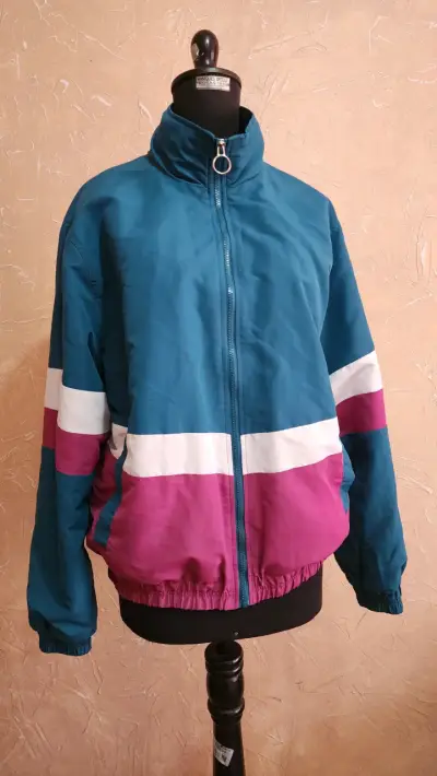 Chaqueta cortaviento retro turquesa y fucsia - miniatura 1