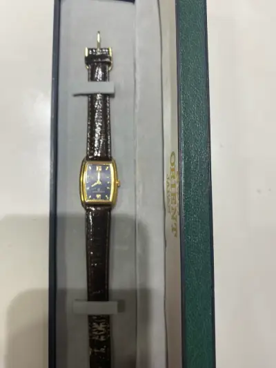 Reloj Orient de cuero y dorado - miniatura 1