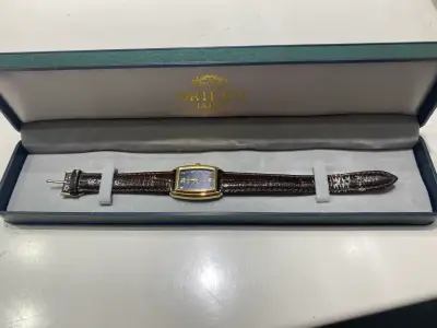 Reloj Orient de cuero y dorado - miniatura 3