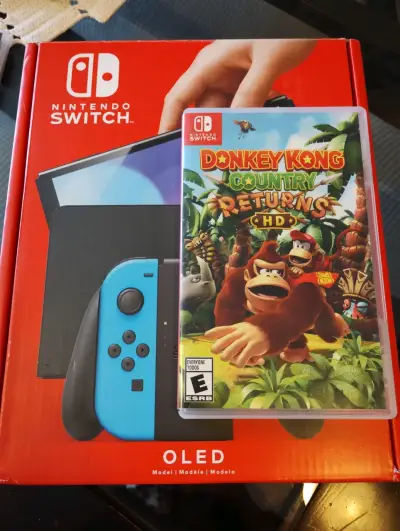Nintendo Switch OLED con juego Donkey Kong - miniatura 1