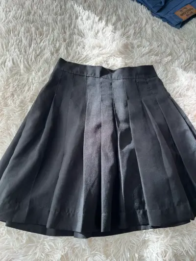 Falda plisada negra elegante - miniatura 1
