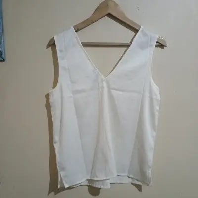 Blusa sin mangas blanca - miniatura 1