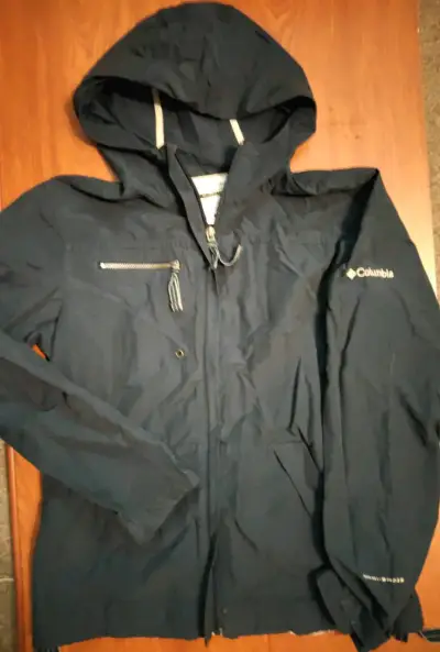 Chaqueta impermeable Columbia azul con capucha - miniatura 1