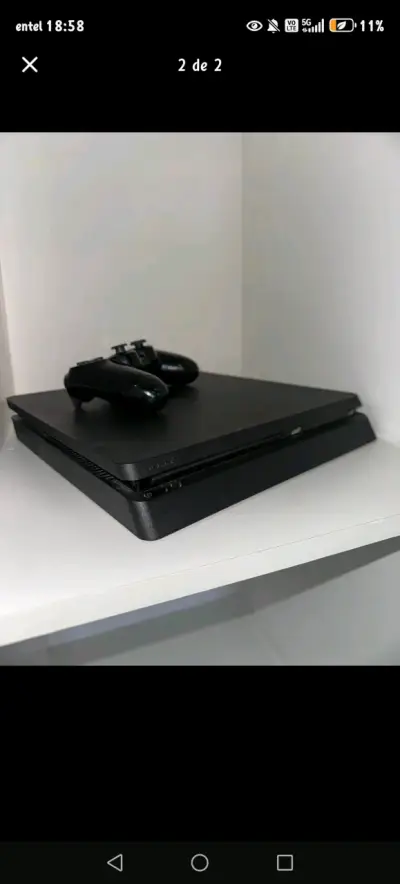 Consola de videojuegos con control - miniatura 1