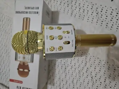 Micrófono inalámbrico con altavoz dorado - miniatura 1