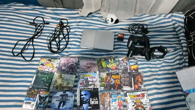 Consola PlayStation 2 con juegos y accesorios - 1