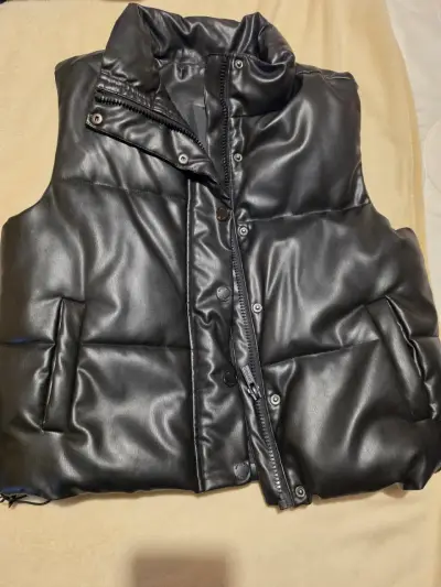 Chaleco acolchado negro para invierno - miniatura 1