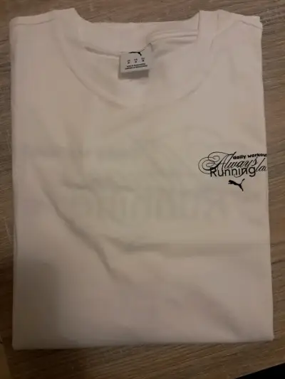 Polera blanca Puma para entrenamiento - miniatura 1
