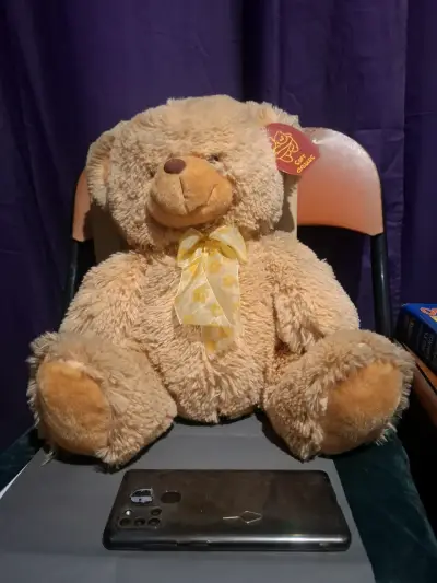 Osito de peluche con lazo amarillo - miniatura 3