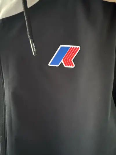 Cortaviento azul con logo - miniatura 1