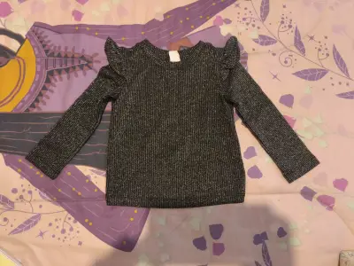 Sweater de niña con volantes brillantes - miniatura 1