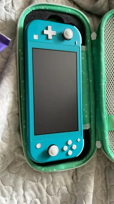 Nintendo Switch Lite turquesa - miniatura 1