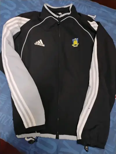 Cortaviento deportivo Adidas negra con logo - miniatura 1