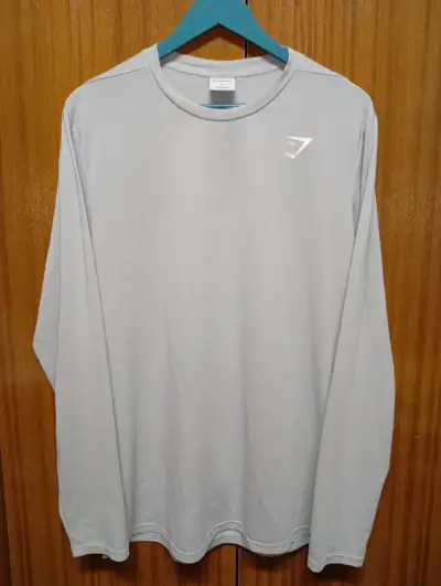 Polera Gymshark manga larga gris para hombre - miniatura 1