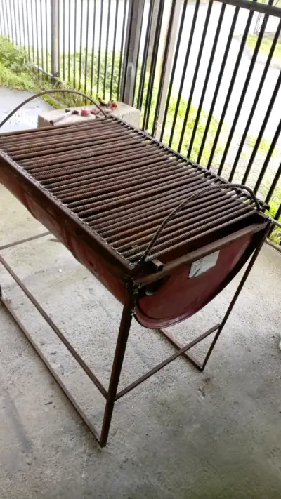 Parrilla de tambor metálica para asados - miniatura 1