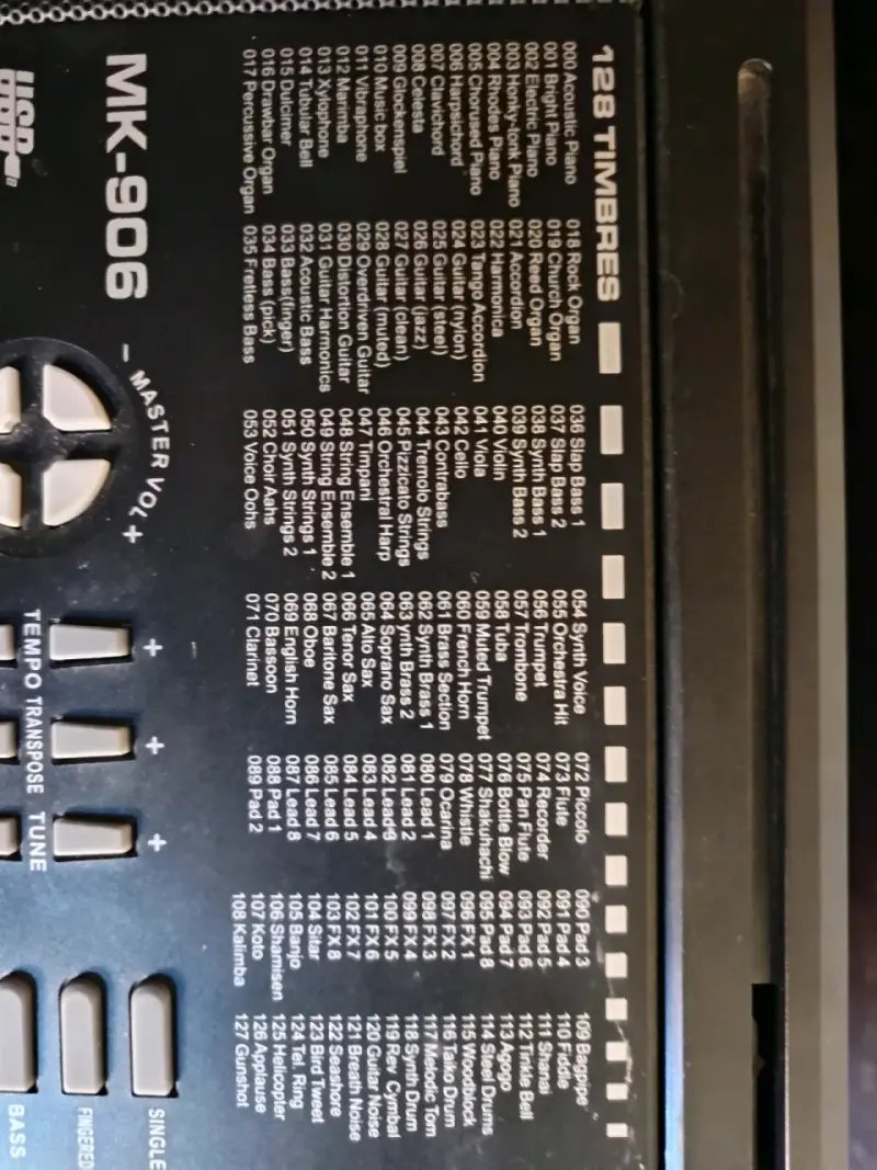 Teclado electrónico MK-906 con 128 timbres - 1