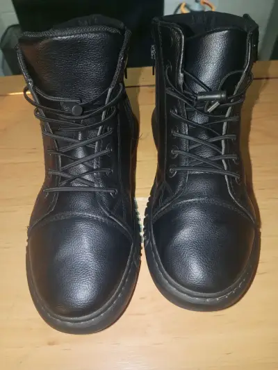 Botas negras de cuero para mujer - miniatura 1