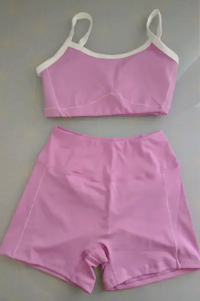 Conjunto deportivo rosa para mujer - miniatura 1