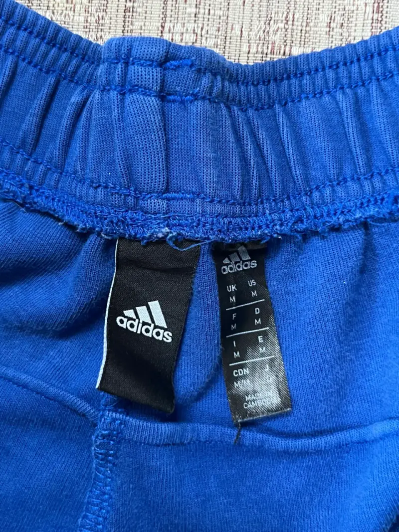 Pantalones deportivos adidas azul con franjas - 5