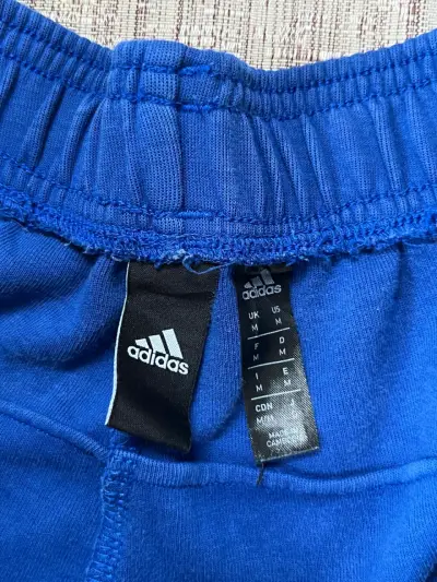 Pantalones deportivos adidas azul con franjas - miniatura 5