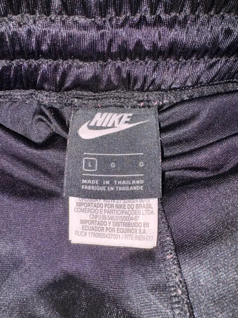 Pantalones deportivos Nike negros con botones - 2