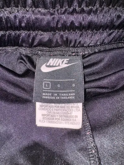Pantalones deportivos Nike negros con botones - miniatura 2