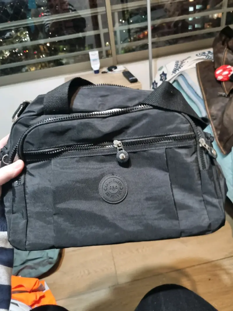 Bolso negro con interior de lunares - 2