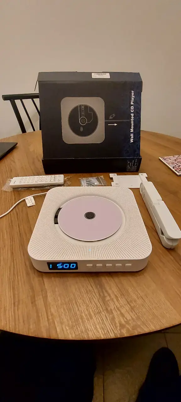 Reproductor de CD montable en pared con control remoto - 1