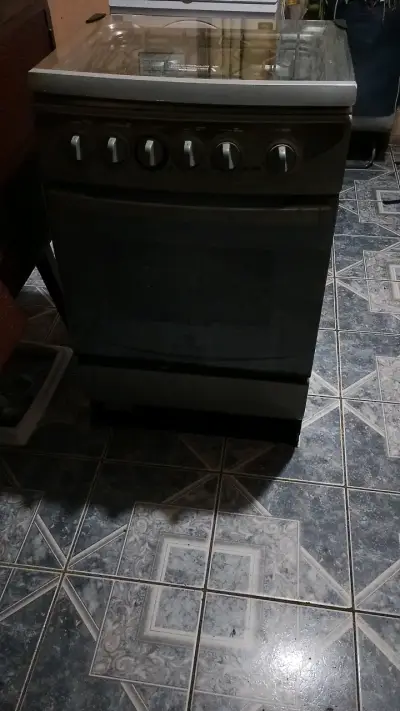 Cocina a gas con horno incorporado - miniatura 1