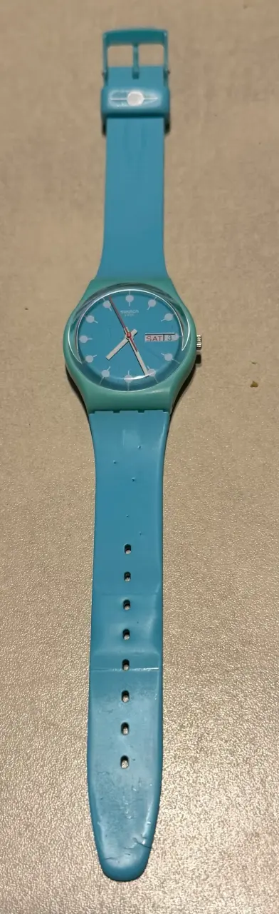 Reloj Swatch azul con correa de silicona - 1