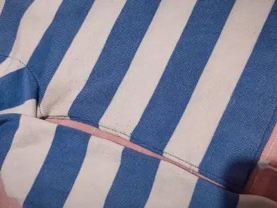 Suéter a rayas azul y blanco - miniatura 2