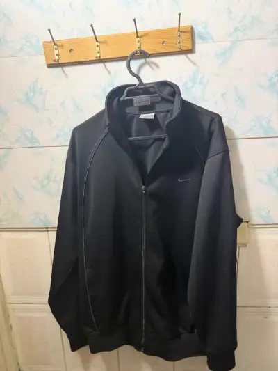 Chaqueta deportiva negra Nike  con cierre - miniatura 1