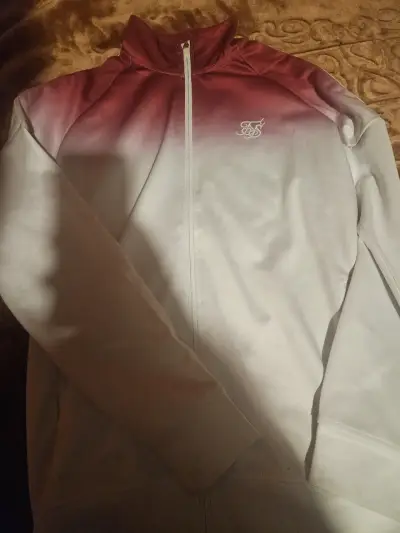 Chaqueta deportiva degradé rojo y blanco - miniatura 1