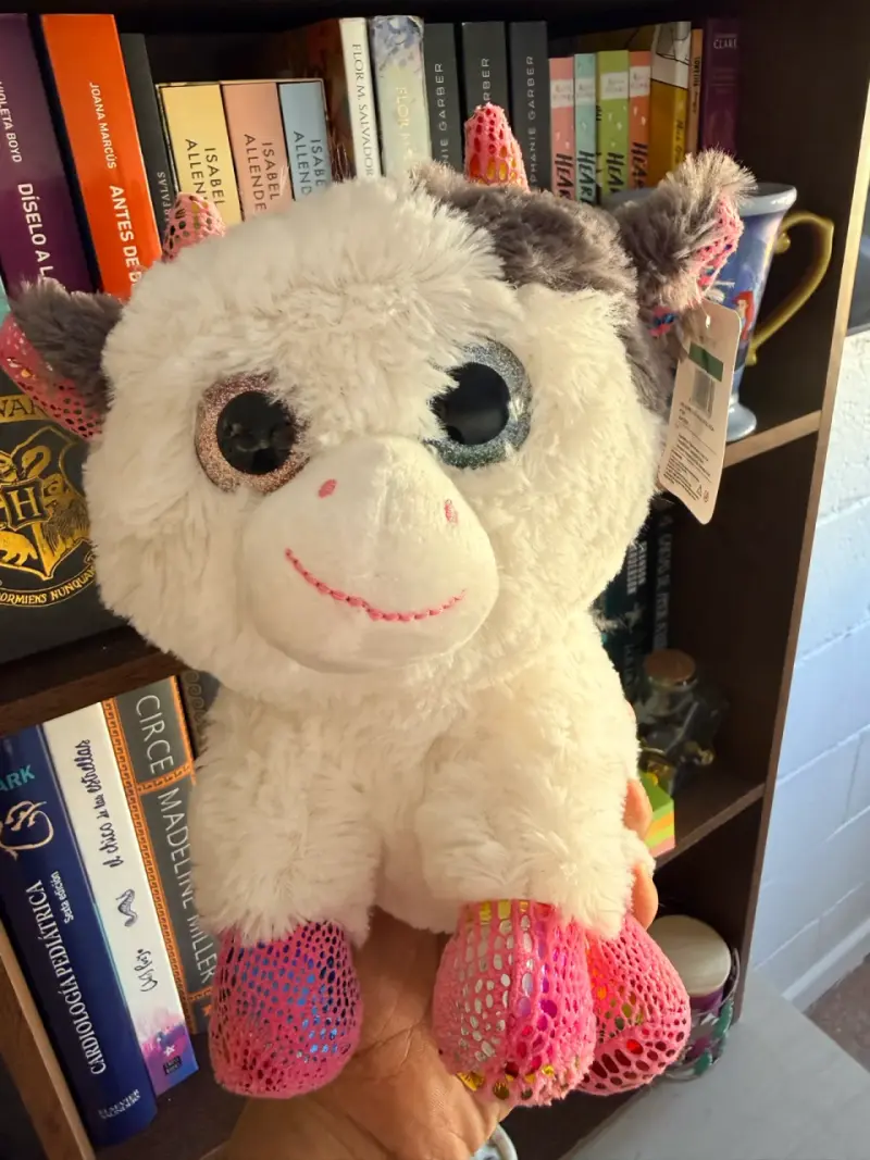 Peluche unicornio blanco con patas brillantes