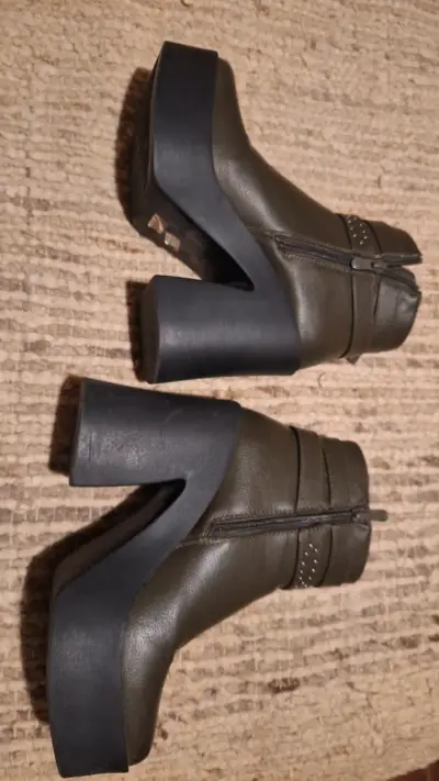 Botines de cuero con tacón alto y cierre - miniatura 1