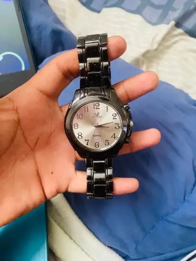 Reloj análogo negro de acero inoxidable - miniatura 1