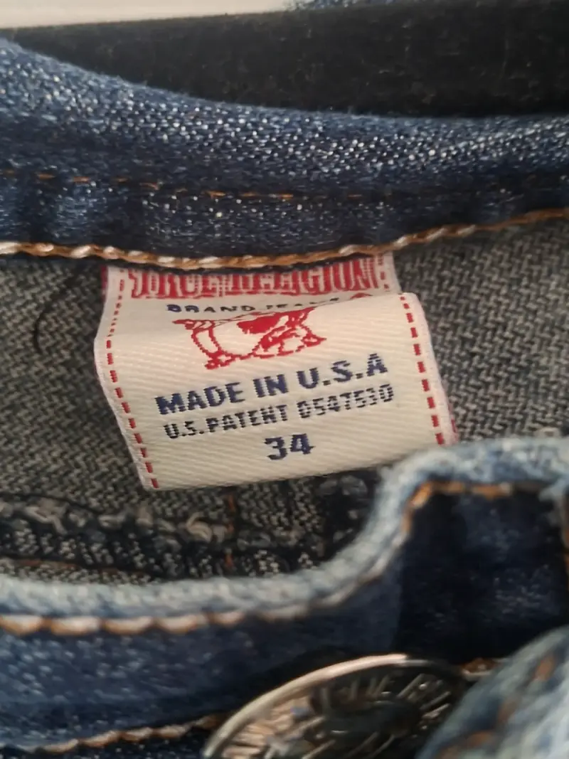 Jeans de mezclilla con detalles desgastados - 5