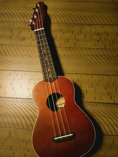 Ukulele acústico de madera color marrón - miniatura 5