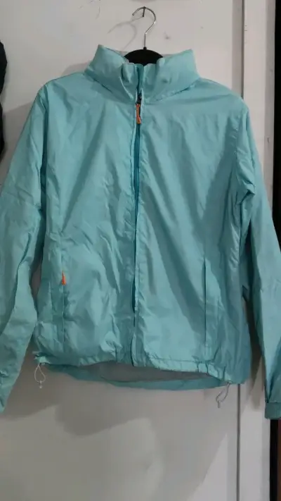 Chaqueta cortaviento azul celeste unisex - miniatura 1