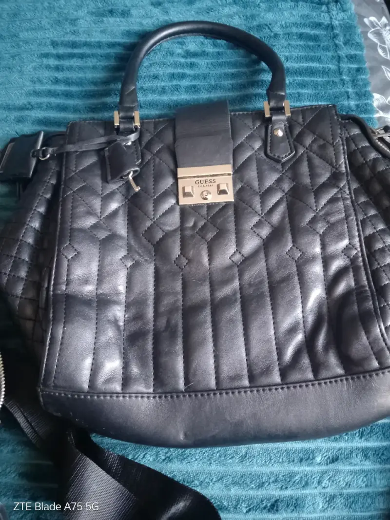 Mochila beige con bolsillo frontal - 2